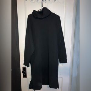 Black ribbed sweater dress. With turtleneck